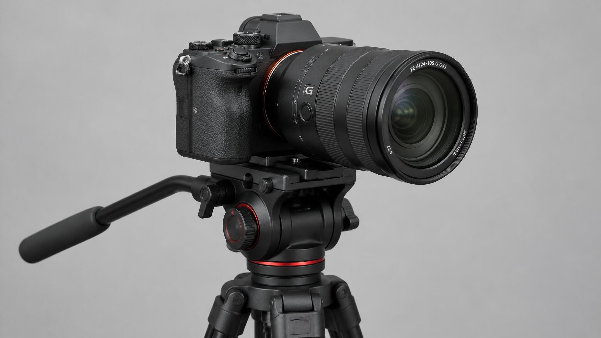 Camera with a zoom lens mounted on a tripod head
